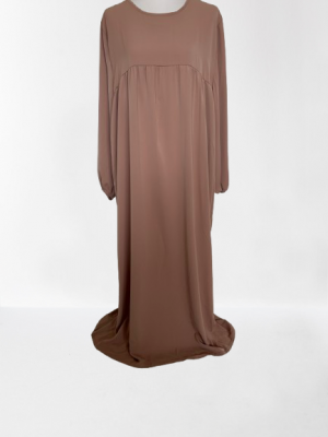 Abaya femme manches bouffantes en Soie de Médine, fluide et opaque, offrant élégance et confort pour une tenue pudique et raffinée. Idéale pour toutes occasions.