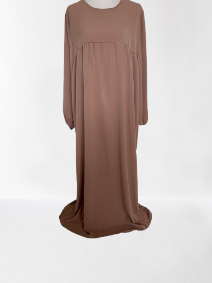 abaya-soie-médine Abaya femme manches bouffantes en Soie de Médine, fluide et opaque, offrant élégance et confort pour une tenue pudique et raffinée. Idéale pour toutes occasions.